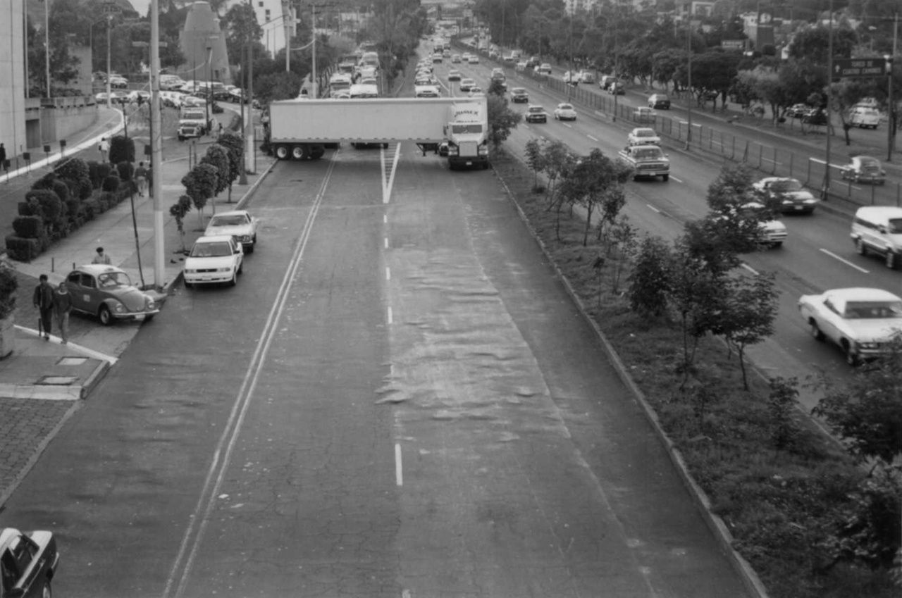 Santiago Sierra, “Obstruction of a Freeway With a Truck’s Trailer,” 1998